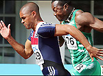 Nigeria's Deji Aliu visibly stressed behind heat winner Jason Gardener of Great Britain at the 10th IAAF World Athletics Championships - Helsinki 2005  - Source: BBC