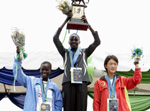 Kenya's Irene Cherotich hold aloft the winners trophy at the 2006 GROE Nairobi Marathon - Source: www.thegreatestrace.com