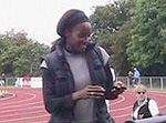 Shaftesbury Barnet's Emma Aina of Nigeria looking at her medal on the podium - Source: Yomi Omogbeja