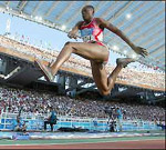 Francoise Mbango Etone of Cameroon leaps to Triple Jump gold  in Athens - Source: BBC